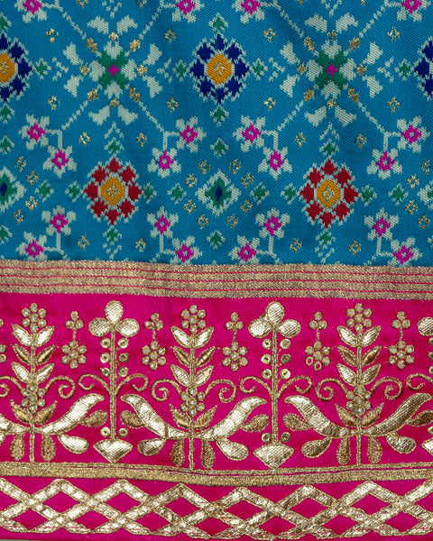 Elegant Sky Blue Patola Saree with Contrast Pink Border