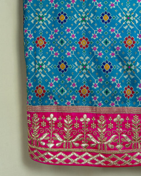 Elegant Sky Blue Patola Saree with Contrast Pink Border