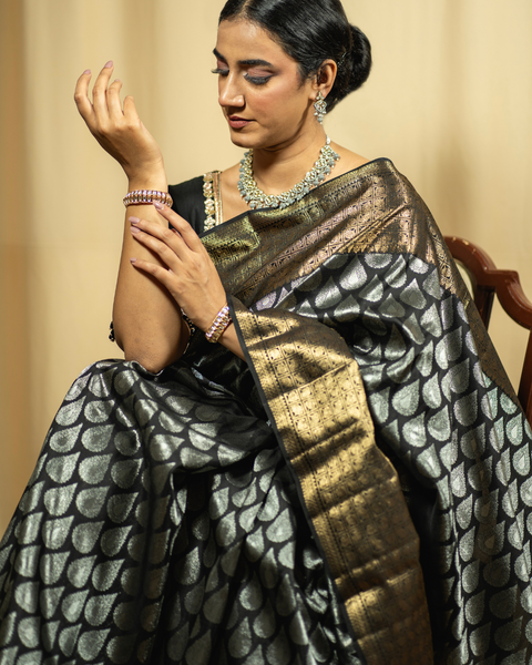 Black Kanjeevaram Silk Saree with Silk Zari Butties and Golden Border