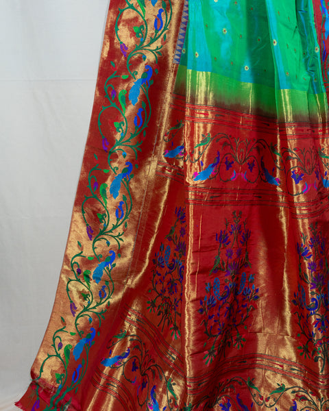 Aqua Blue Silk Paithani Saree with Lotus &amp; Peacock Border