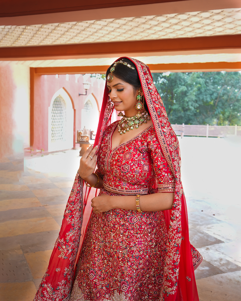 Regal Red Embroidered Bridal Lehenga – A Timeless Masterpiece