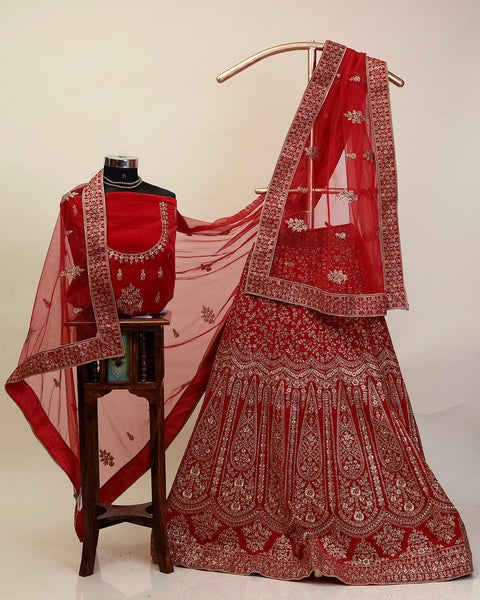 Red Velvet Bridal Lehenga handwork of stone and zari, along with the floral buttis